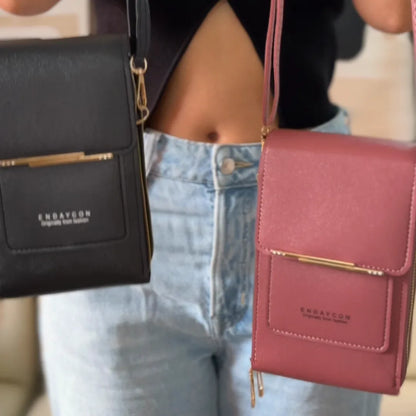 Bolso bandolera porta celular negro y rosado coral usados cruzados